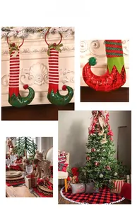 Detailed view of Christmas elf leg stockings, plaid tree skirts and festive home decor set