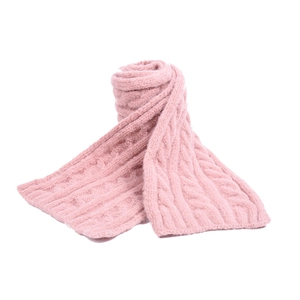 Detailed macro view of pink cable knit texture on a soft winter beanie for toddlers