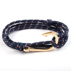 Navy style multi-layer braided paracord bracelet with a gold metal fish hook clasp