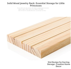 Macro shot of natural solid wood jewelry display stand with four parallel ring slots