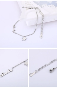 Detailed close-up of silver Lucky star bracelet showing the 18KGP hallmark and lobster clasp