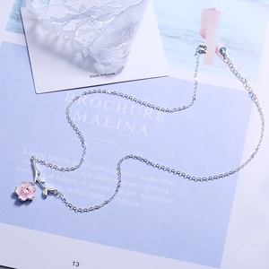 Minimalist S925 silver necklace featuring a pink enamel cherry blossom pendant with zircon