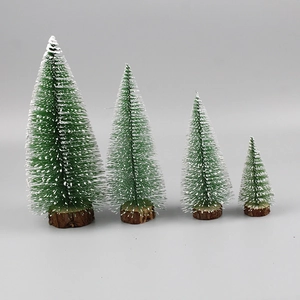 Miniature sisal Christmas trees with snow dusting and wood base in four various sizes