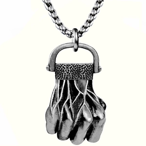 Detailed view of silver fist pendant with root texture on a matching metal chain