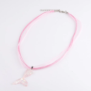 Detail of pink gauze cord necklace featuring a glittery mermaid tail pendant and metal clasp