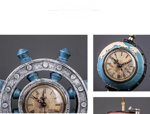 Detail of vintage ship wheel and globe desk clocks with retro Roman numeral dials
