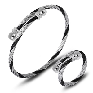 Detail view of twisted stainless steel cable jewelry set with ring and bracelet