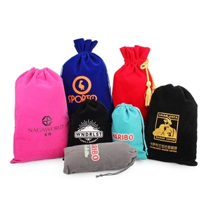 Various colored velvet drawstring jewelry pouches with custom printed logos on white background