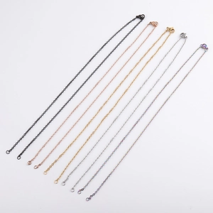 Multiple colors of 2mm stainless steel O-chain necklaces with lobster clasps on white
