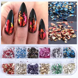 Macro detail of 12-grid nail art foil flakes set showing colorful metallic textures