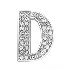 Macro view of crystal encrusted letter D slide charm for DIY jewelry bracelets