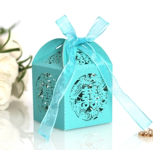 Laser-cut cyan wedding candy box with traditional double happiness pattern and ribbon