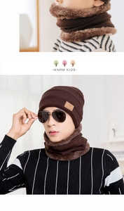 Detail of warm winter knit hat and neck warmer with thick faux fur fleece lining