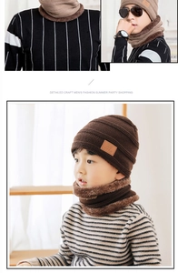 Detail of warm winter knit hat and scarf set with thick fleece lining and brand leather patch