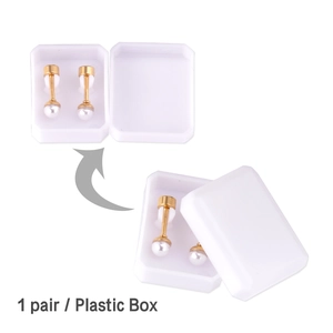 Detail of white pearl stud earrings with gold finish and its plastic storage case