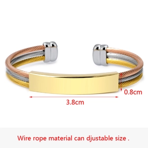Detailed macro view of the three-tone wire rope bangle showing 3.8cm metal plate