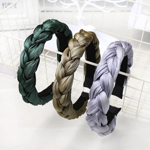 Three colors of braided twist headbands made from elegant satin fabric for women