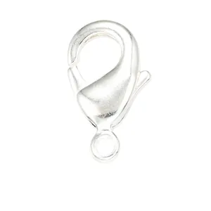 Macro detail of high quality silver lobster clasp jewelry connector on plain background