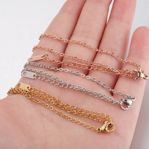 2mm stainless steel DIY bracelet chains in gold, silver, and rose gold on a palm