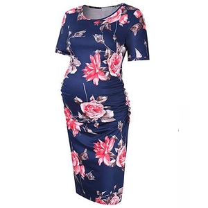Short sleeve floral maternity dress in navy blue with side ruched detail and crew neck