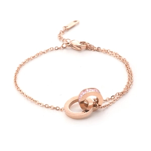 Bracelet double anneau or rose avec pierres roses et chiffres romains classiques