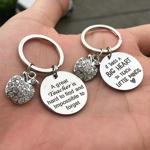 Silver teacher appreciation keychains with apple charm and engraved heart quotes