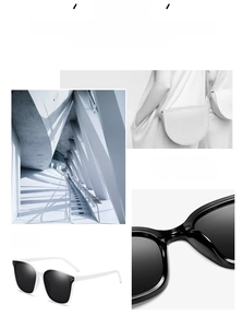 Macro detail of fashionable white and black polarized square frame sunglasses with dark lenses