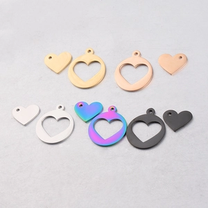 Set of stainless steel hollow heart charms in gold silver and black finishes