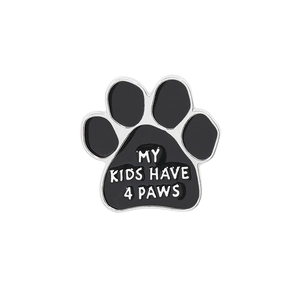 Detail of enamel dog paw brooch with My Kids Have 4 Paws text on white background