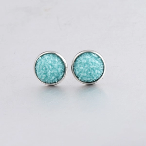 Detail view of 10mm blue drusy stud earrings with sparkling resin and steel setting