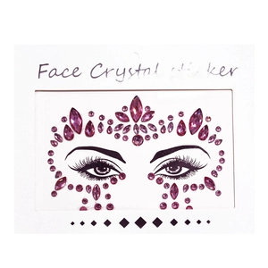 Macro view of pink Face Crystal sticker with rhinestone pattern for masquerade