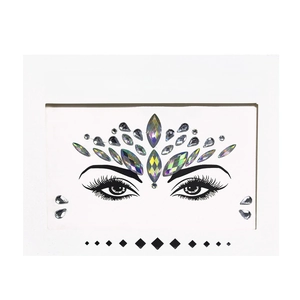 Detail shot of iridescent resin face crystal stickers for makeup and festival body art