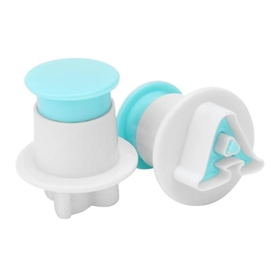 Detail of alphabet cookie plungers showing the letter A shape in white and blue plastic