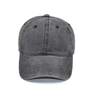 Detail of washed cotton baseball cap crown with six-panel stitching and ventilation eyelets