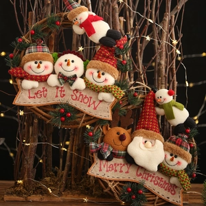 Christmas wreath set with Santa Snowman Reindeer plush dolls on natural rattan rings