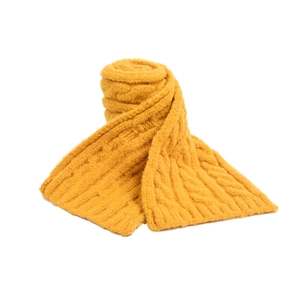 Detailed view of ginger yellow cable-knit scarf texture for warm winter comfort