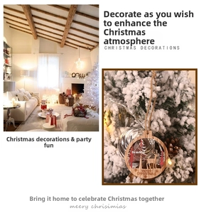 Detail of wooden Christmas tree and reindeer ornament with Merry Christmas engraving