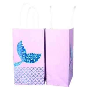 Detail of purple mermaid tail gift bags with holographic laser scales and paper handles