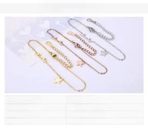 Detailed view of Lucky letter and star charms on stainless steel chain bracelets