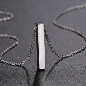 Macro view of polished stainless steel vertical bar pendant necklace with mirror finish