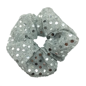 Silver sequin hair scrunchie with metallic glitter finish for festive holiday styling