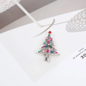 Exquisite vintage Christmas tree brooch with colorful crystals on silver metal base