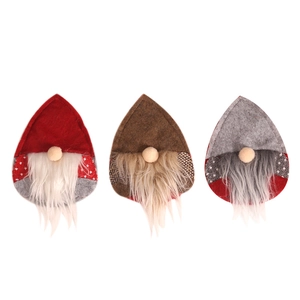 Three Nordic Christmas gnome ornaments in red, brown, and grey with plush beards