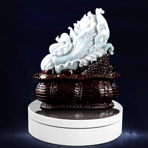 Electric rotating stand with jade cabbage ornament on a smart motorized turntable