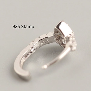 Macro shot of S925 sterling silver earring featuring an authentic 925 hallmark stamp