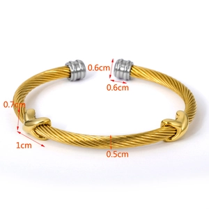 Detailed view of two-tone twisted cable bracelet showing 0.5cm width and golden X motifs