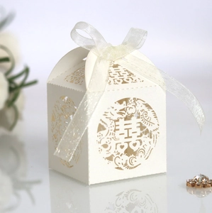 Ivory Chinese wedding candy box with laser-cut Double Happiness design and silk ribbon