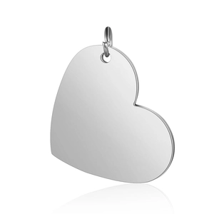 Macro detail of a mirror-polished silver stainless steel heart-shaped pendant with bail