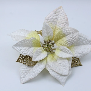Detailed view of 22cm white Christmas poinsettia with gold glitter petals and hollow mesh leaves