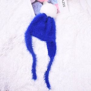 Deep blue plush knit winter hat with white pompom and ear flaps for kids and babies